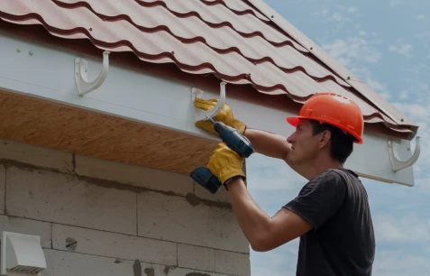 Instalación de ventanas Velux para tejados en una vivienda con techos inclinados, mejorando la iluminación natural y ventilación en Alcalá de Henares