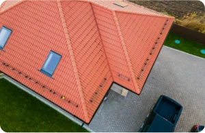 tiled_roof_against_blue_sky_with_clouds_idea_background_with_space_text_ecofriendly_traditional_roofs_home_1